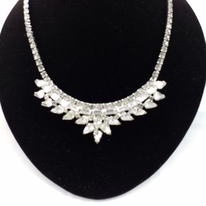 Clear and shiny three shape rhinestone necklace.